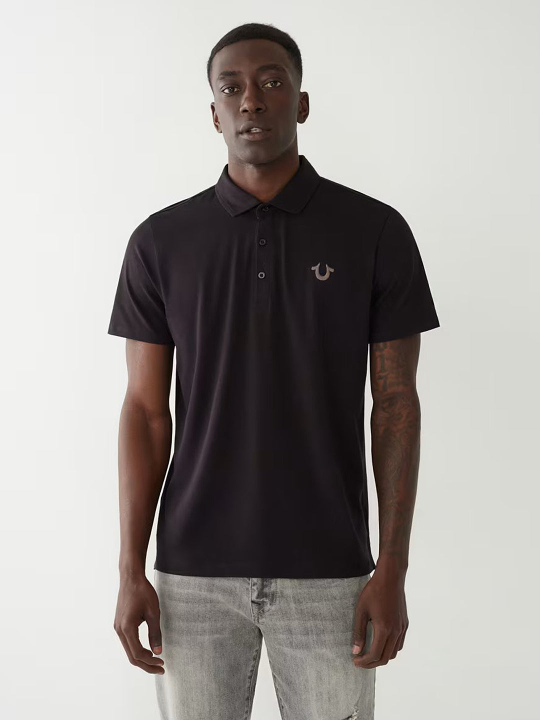 Black solid polo t shirt online