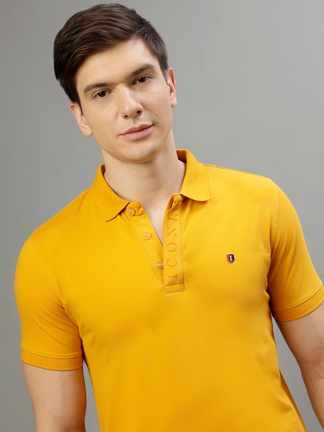 Iconic Men Mustard Solid Polo Collar Short Sleeves T-Shirt