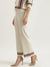 Elle Women Cream Solid Relaxed Fit Mid-Rise Flat Front Trouser