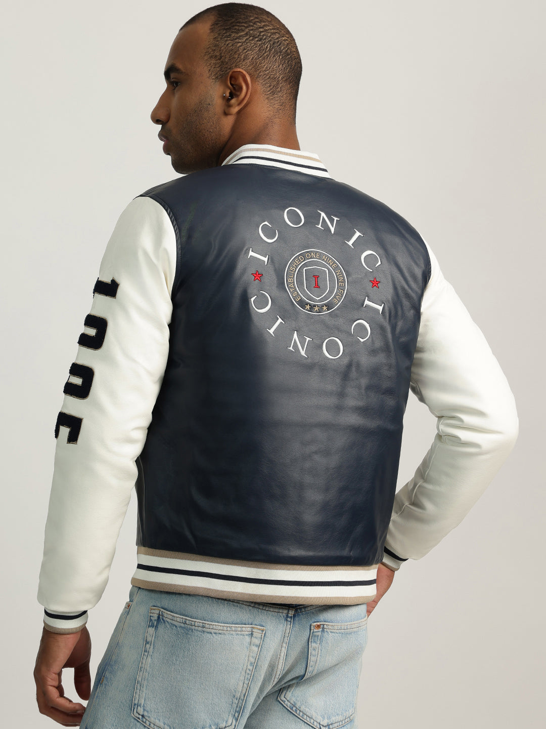 Iconic Men Blue Color-Blocked Stand Collar Full Sleeves Varsity Jacket