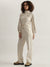 Iconic Women Beige Solid High Neck Full Sleeves Jumpsuit