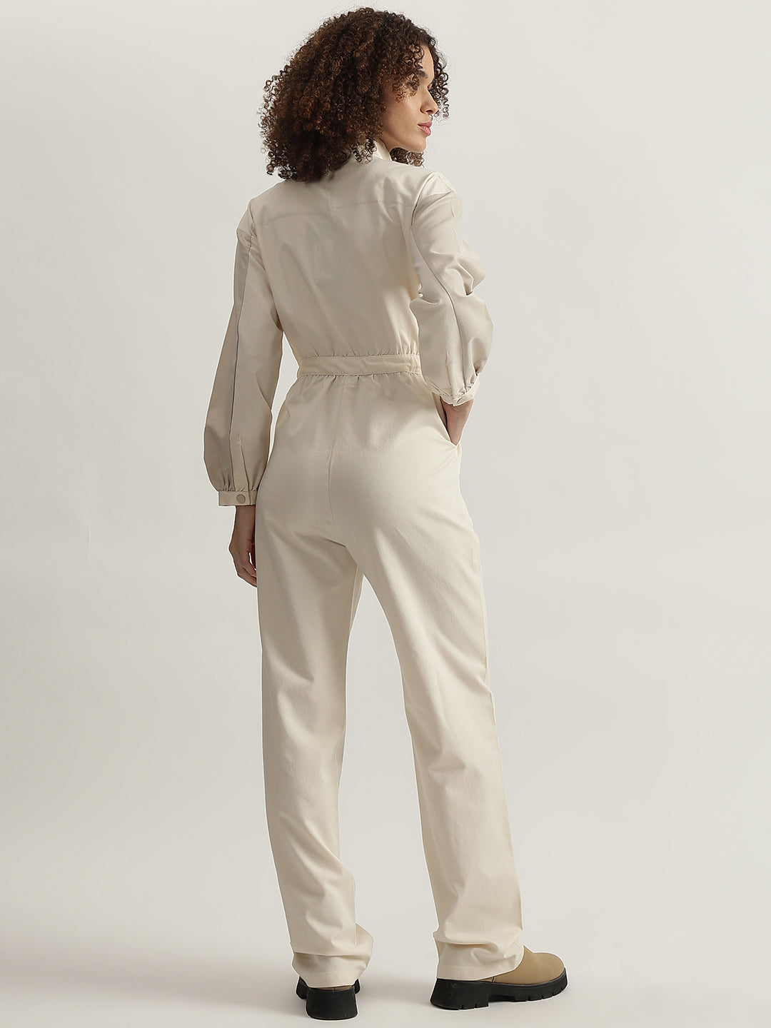 Iconic Women Beige Solid High Neck Full Sleeves Jumpsuit