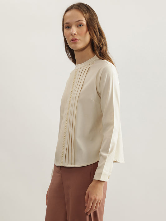 Iconic Women Cream Solid Round Neck Full Sleeves Top